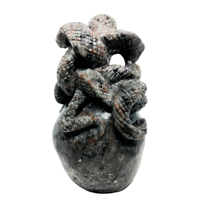 865G Yooperlite Crystal Skull with Snakes