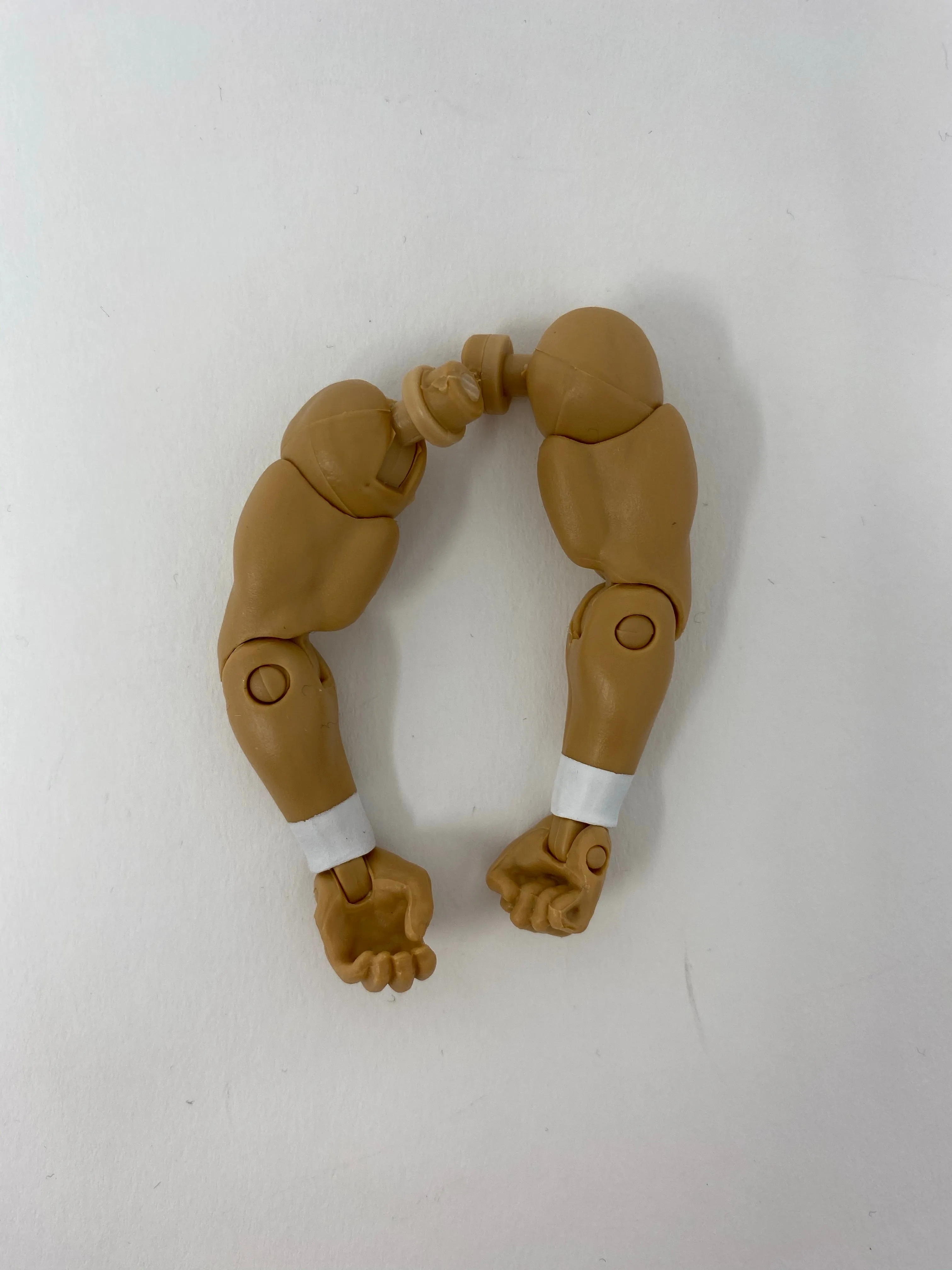 Arm (White wrist tape/fist in right hand) (C)