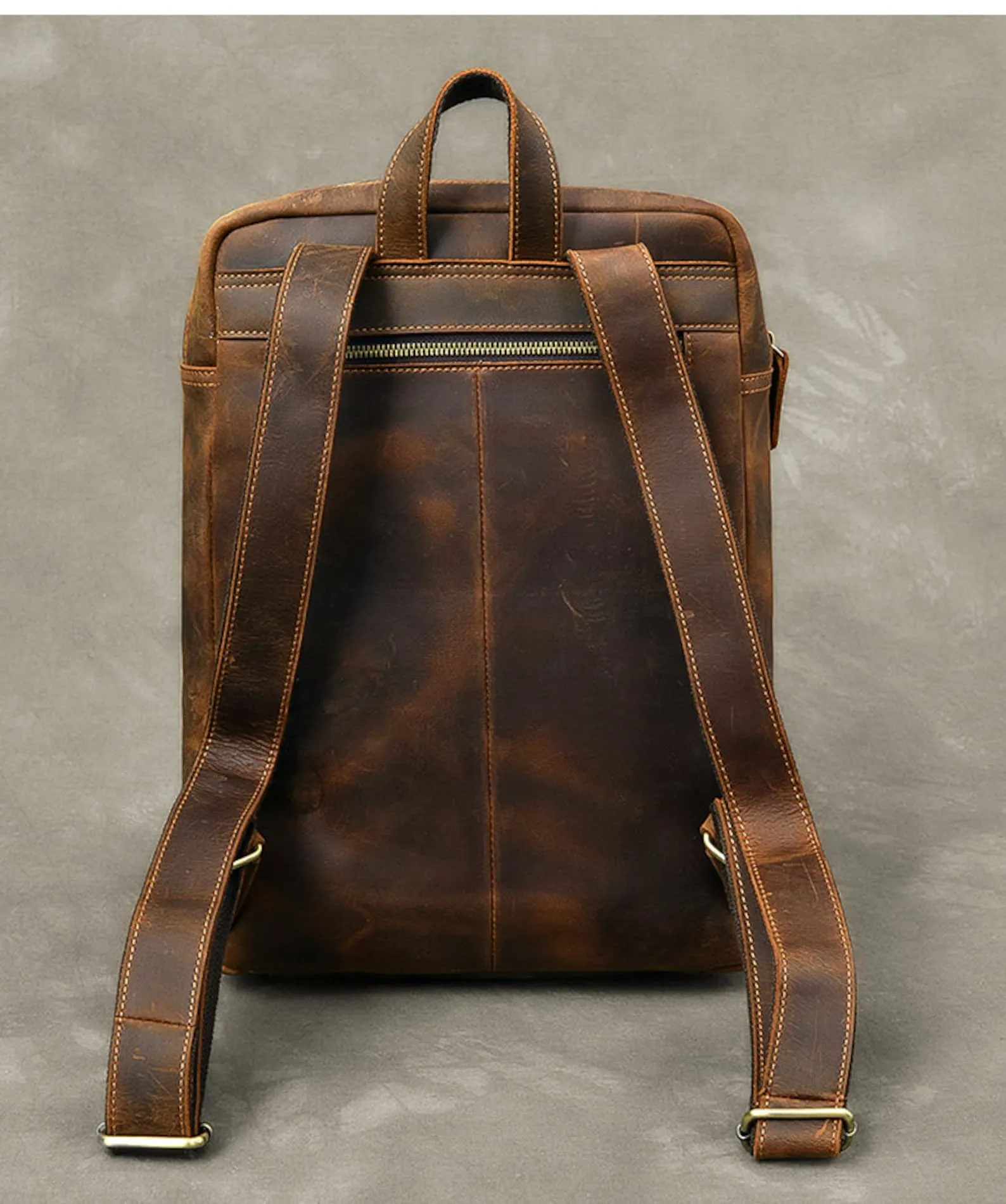 dark brown leather backpack