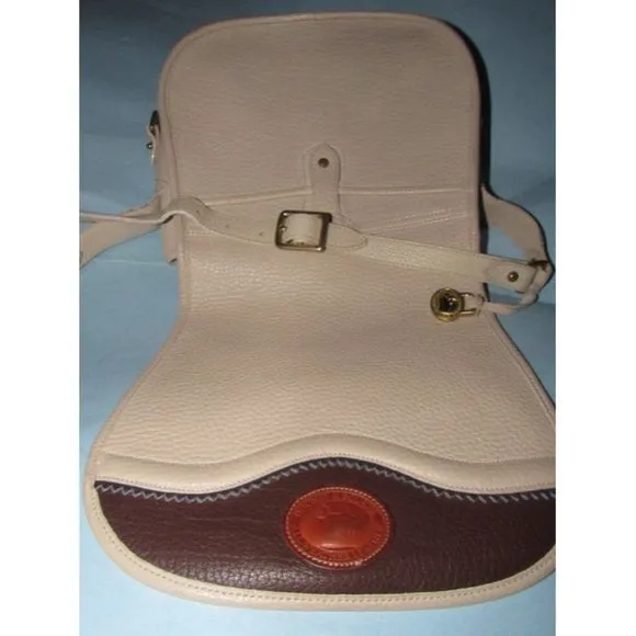 Dooney and Bourke Vintage Brown Ivory Saddle Bag
