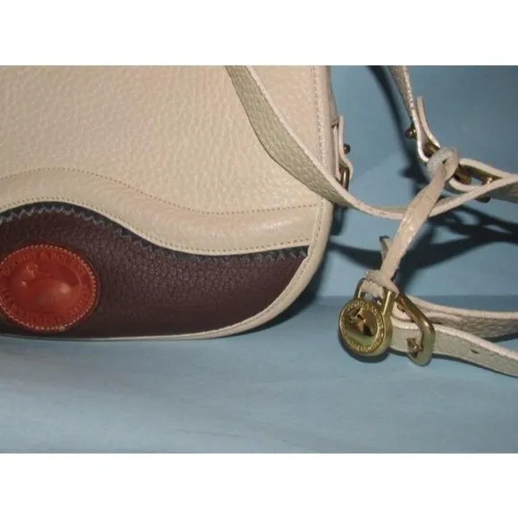 Dooney and Bourke Vintage Brown Ivory Saddle Bag