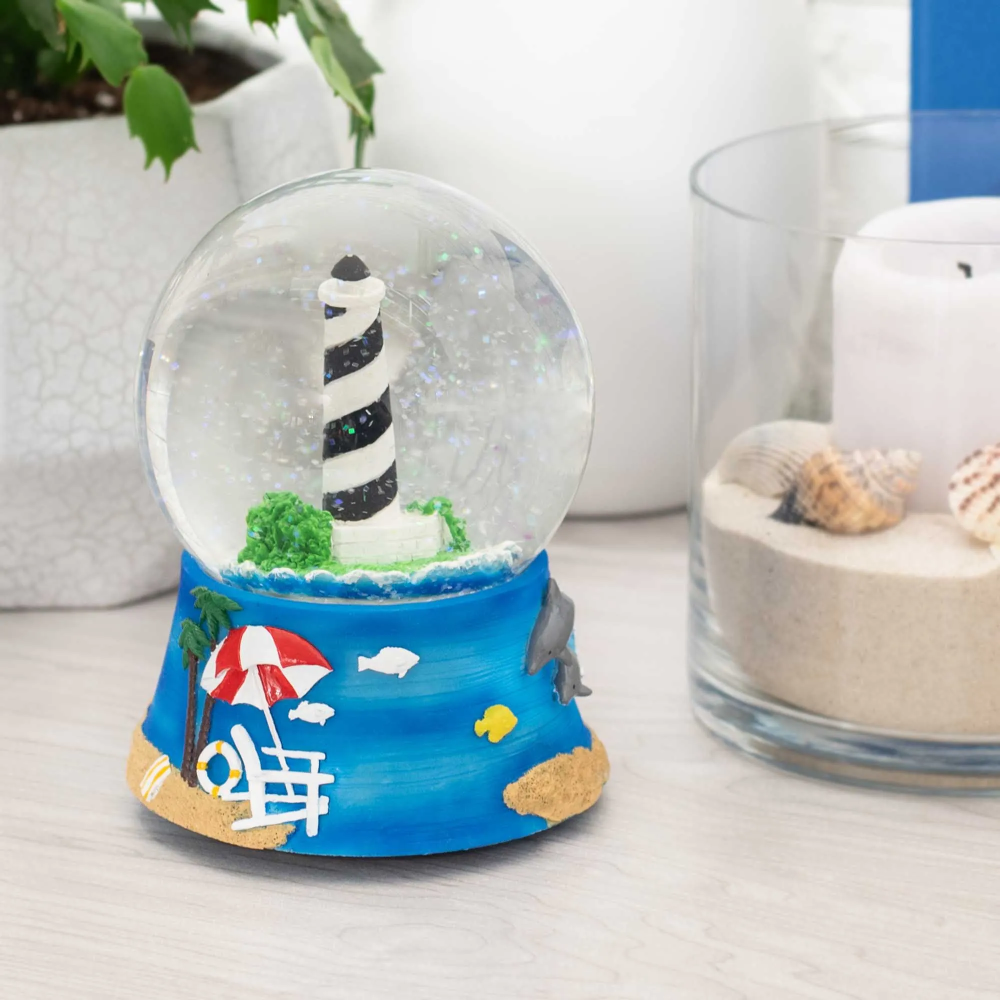 Nautical Lighthouse Figurine 100MM Snow Globe Plays Tune By the Beautiful Sea